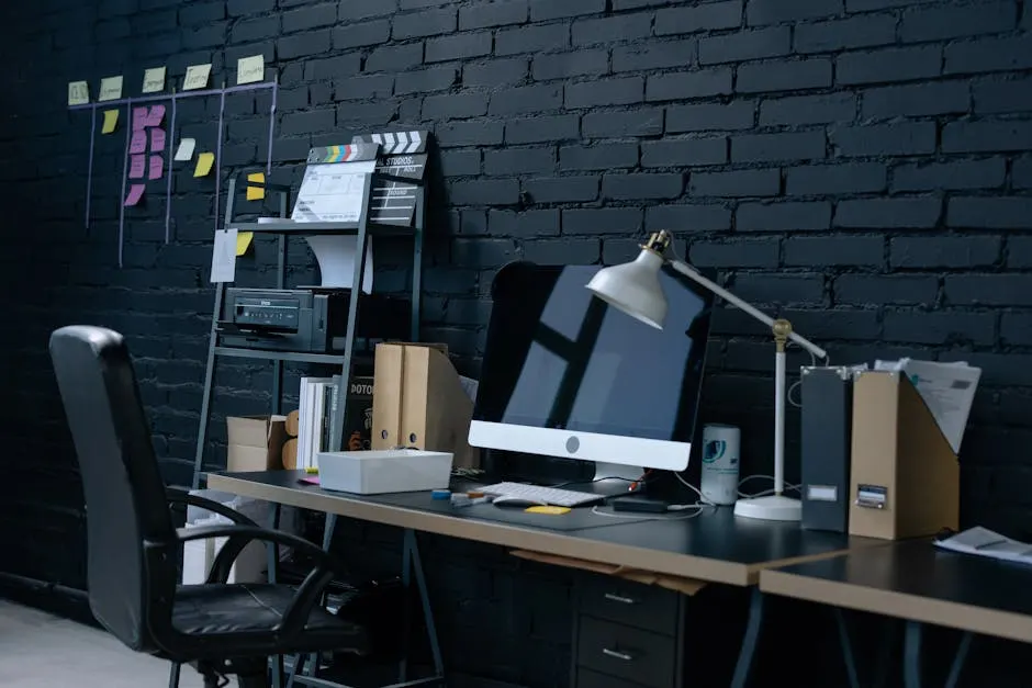 Modern home office workspace with desktop computer and considered objects